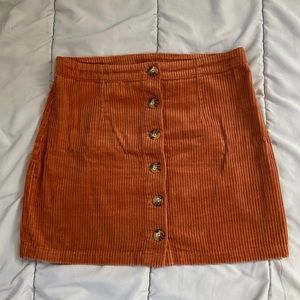 Buttoned mini skirt